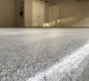 A quartz epoxy floor in a Dallas residence showing the texture with the walls of the home in the background.